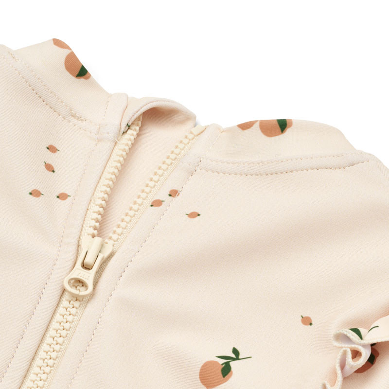 LIEWOOD Sille baby plavky s dlhým rukávom Peach / Sea shell