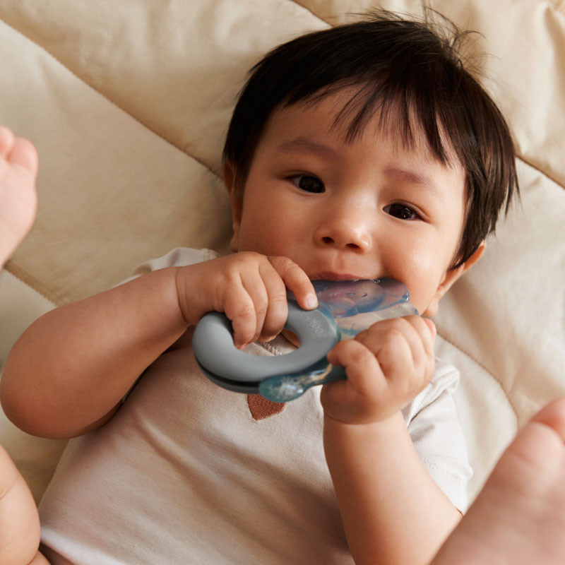 LIEWOOD chladiace hryzátko Rita sloník 2 ks Sandy / Dove blue