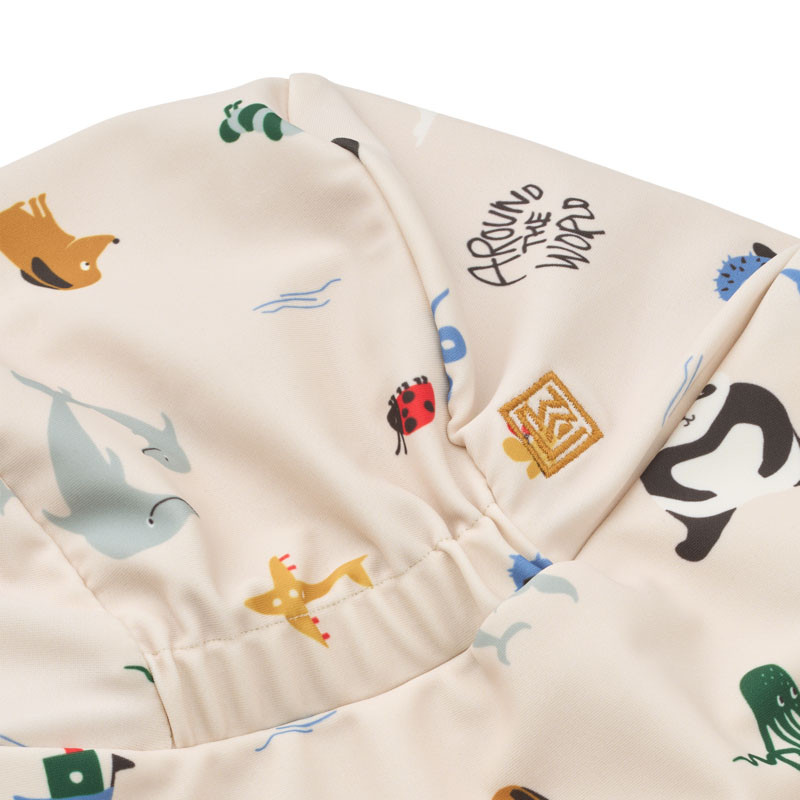 LIEWOOD Detský UV klobúk na plávanie Cecilia Around the world / Sandy