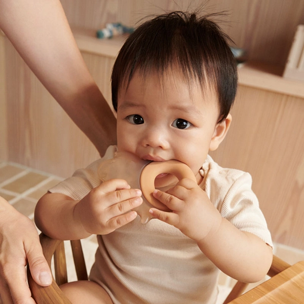 LIEWOOD chladiace hryzátko Rita sloník 2 ks Pale tuscany / Sandy