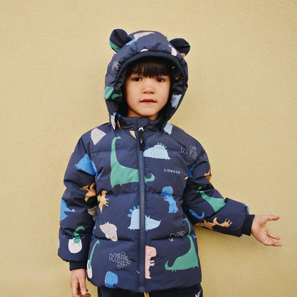 LIEWOOD Polle páperová bunda Dino roar / Classic navy LIEWOOD Polle páperová bunda Dino roar / Classic navy